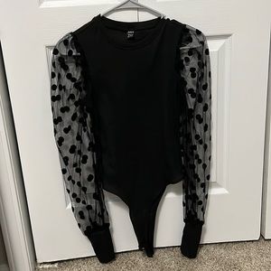 Black pock-a dot body suit